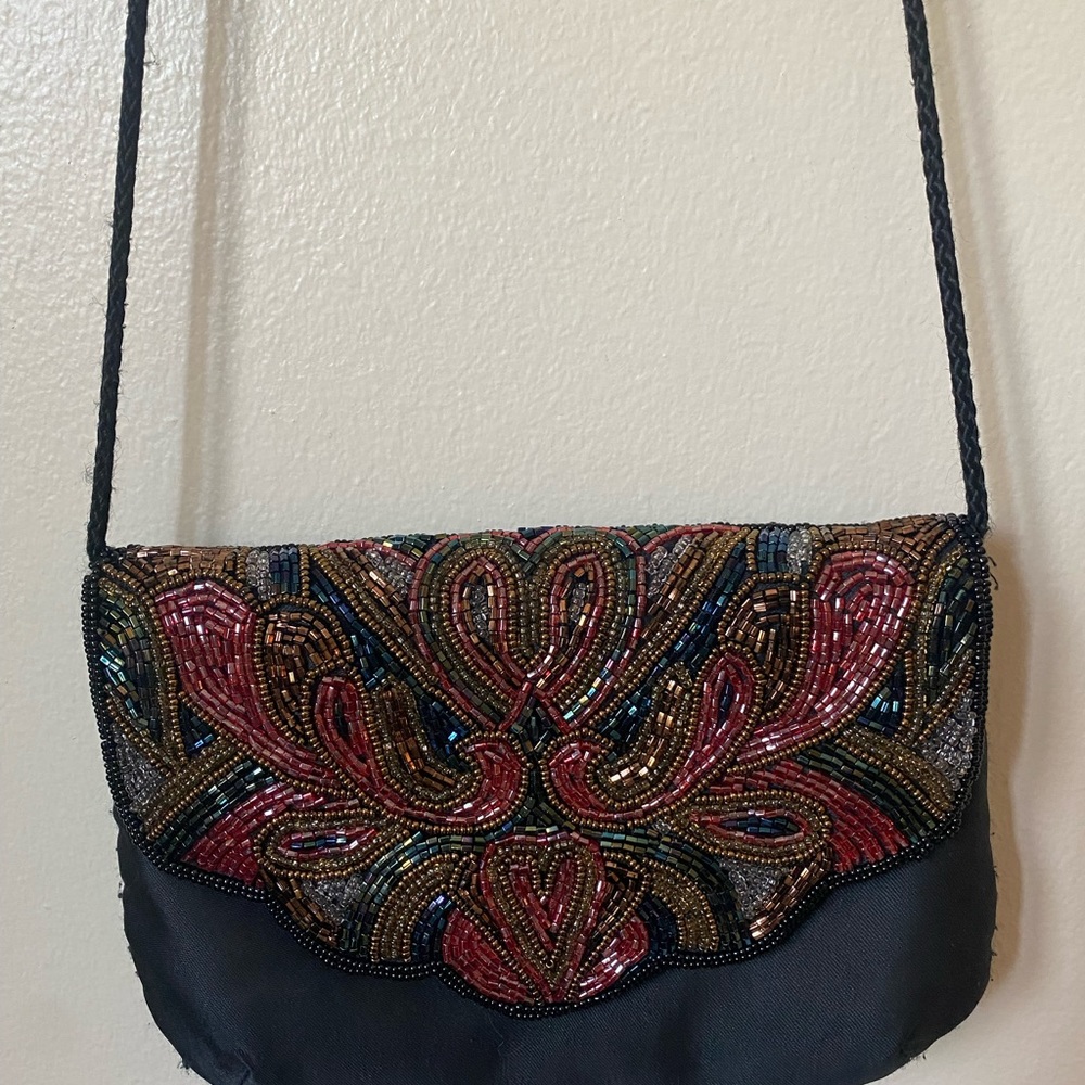 Tiny satin bag with beaded cover